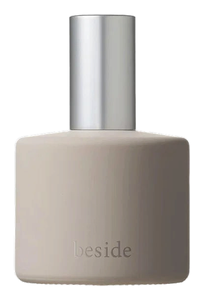 beside
